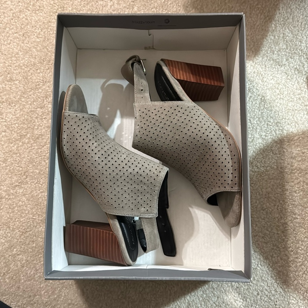 ADAM TUCKER HEELS